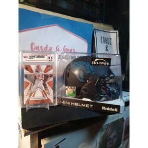 Trevor Lawrence Graded Rookie Card & Jacksonville Jaguars Mini Helmet
